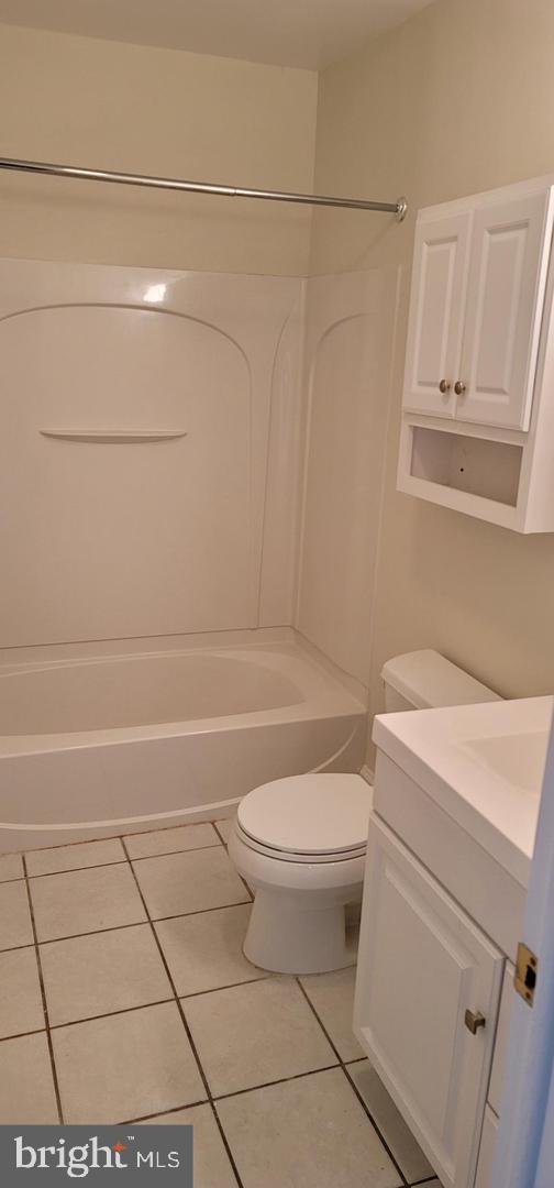 114 Van Buren Road, Unit 5 Voorhees, NJ 08043 - Photo 11 of 11 a bathroom with a white toilet and a shower
