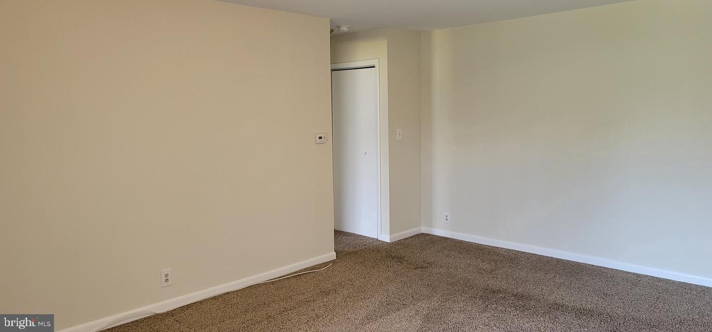 114 Van Buren Road, Unit 5 Voorhees, NJ 08043 - Photo 10 of 11 a view of an empty room