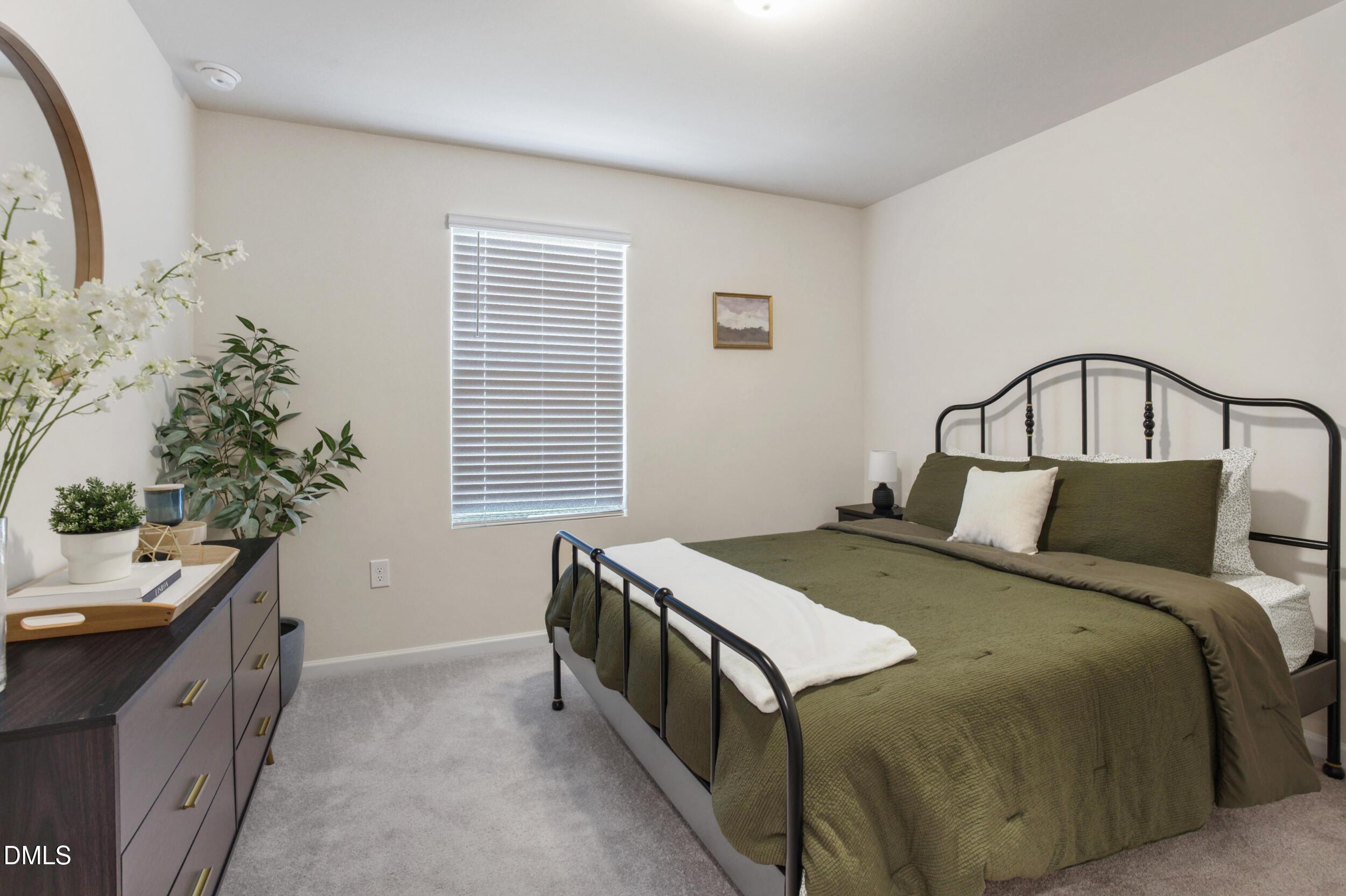 1416 Heron Pond Street Raleigh, NC 27604 - Photo 20 of 25 a bedroom with a bed and a window