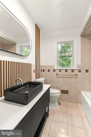 a view of an empty room with stairs