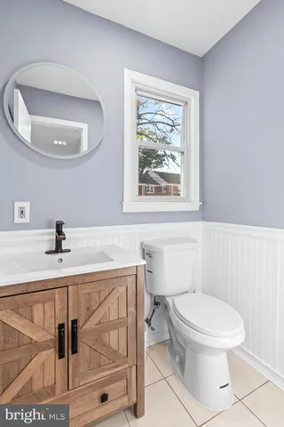 a bathroom with a toilet and a sink