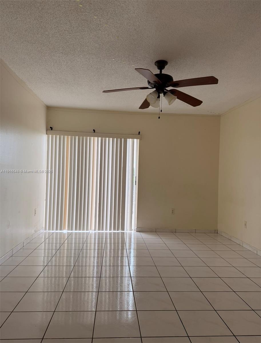 1900 West 54th Street, Unit 320 Hialeah, FL 33012 - Photo 11 of 19 a view of an empty room