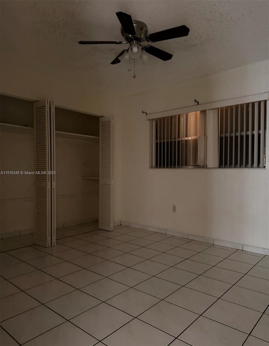 1900 West 54th Street, Unit 320 Hialeah, FL 33012 - Photo 18 of 19 a view of an empty room