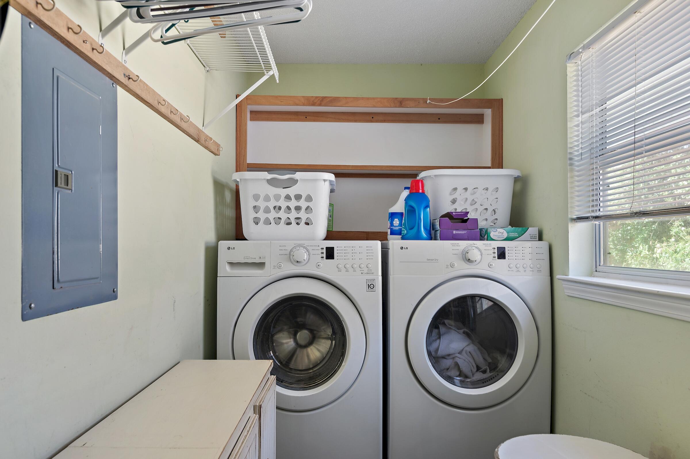 4485 Luke Avenue, Unit B Destin, FL 32541 - Photo 19 of 22 a utility room with dryer and washer