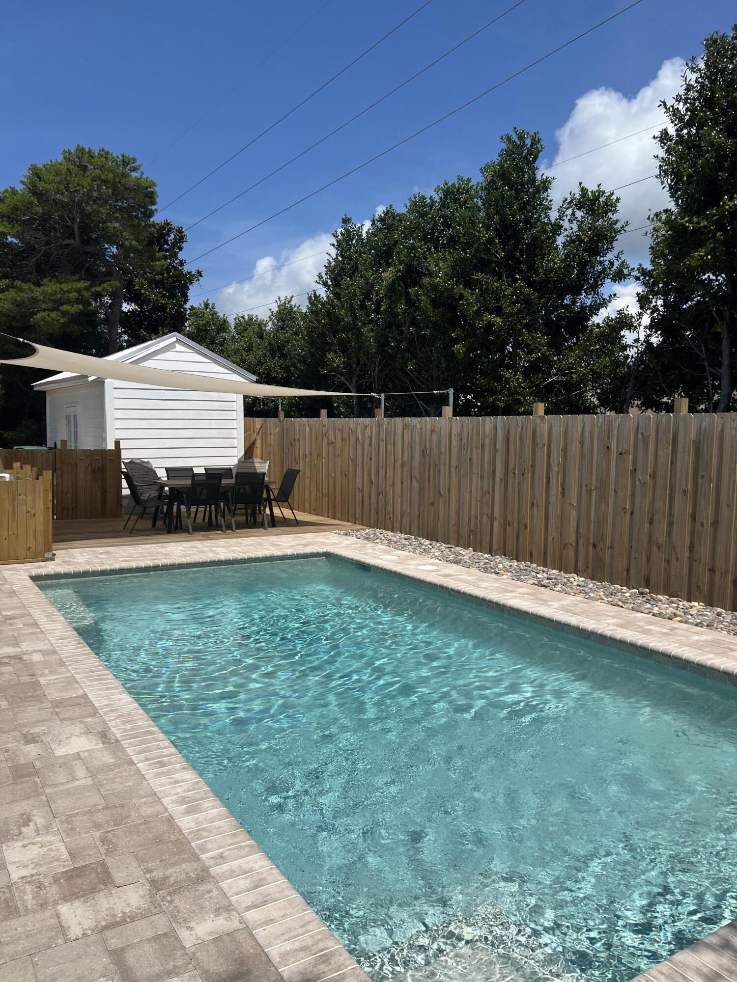 4485 Luke Avenue, Unit B Destin, FL 32541 - Photo 21 of 22 a view of a back yard
