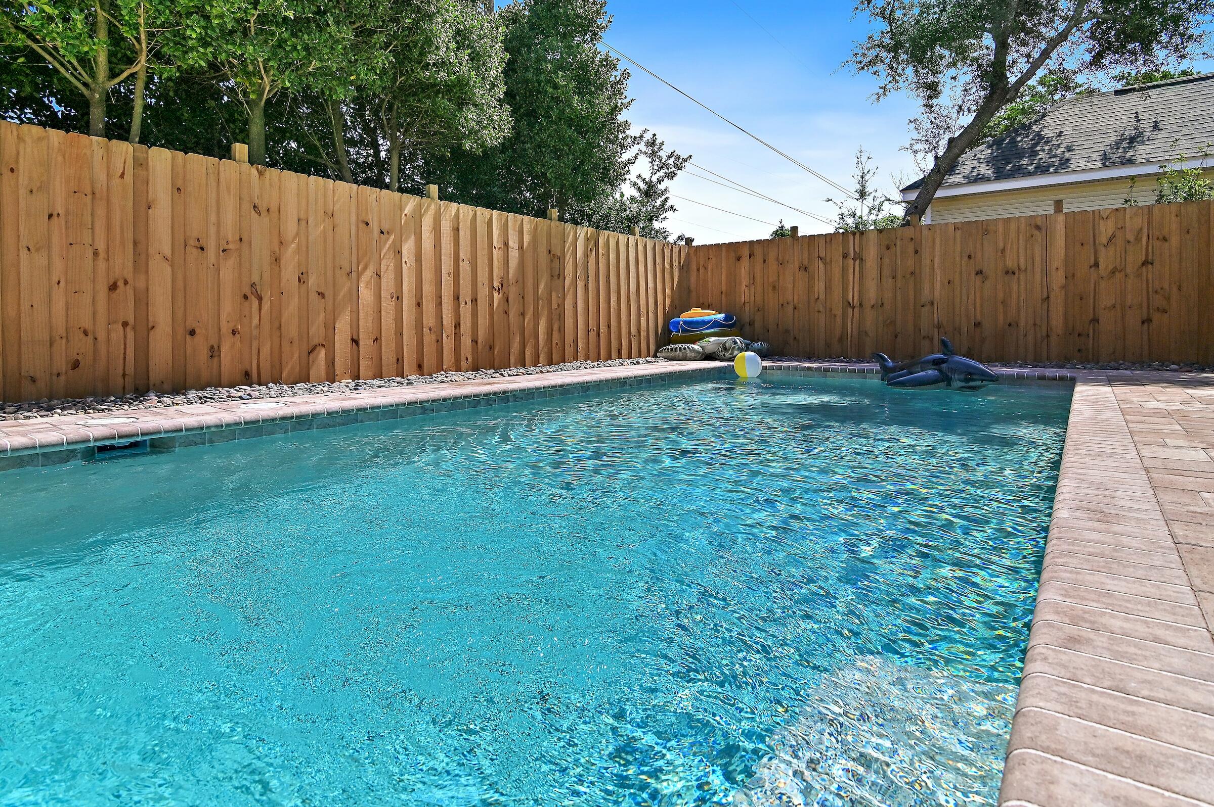 4485 Luke Avenue, Unit B Destin, FL 32541 - Photo 9 of 22 a view of a backyard with wooden fence