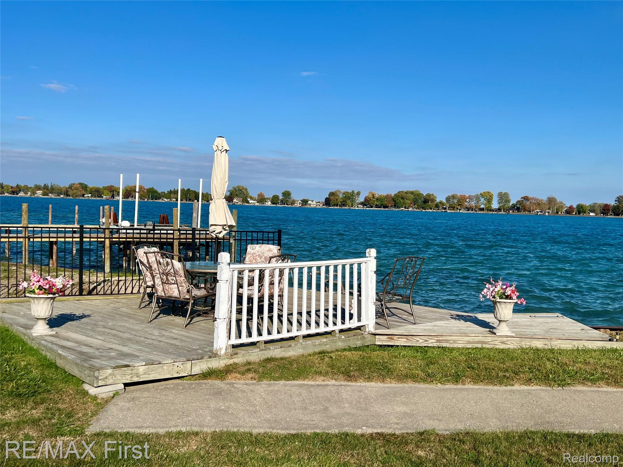 9280 River Road Algonac, MI 48001 - Photo 3 of 44 Dock area with a deck with water view