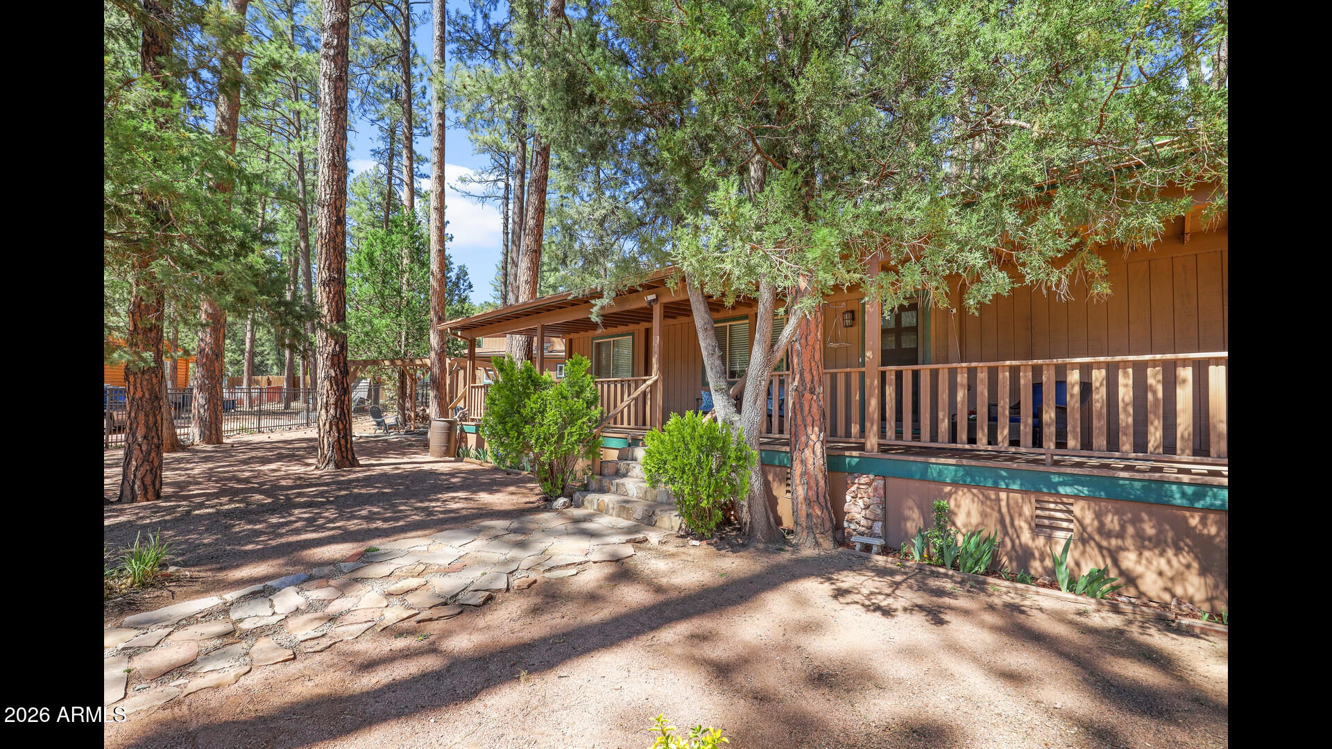 512 Standage Drive Payson, AZ 85541 - Photo 25 of 46 a view of a yard with plants and large trees