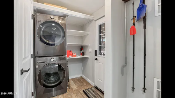 a utility room with dryer and washer
