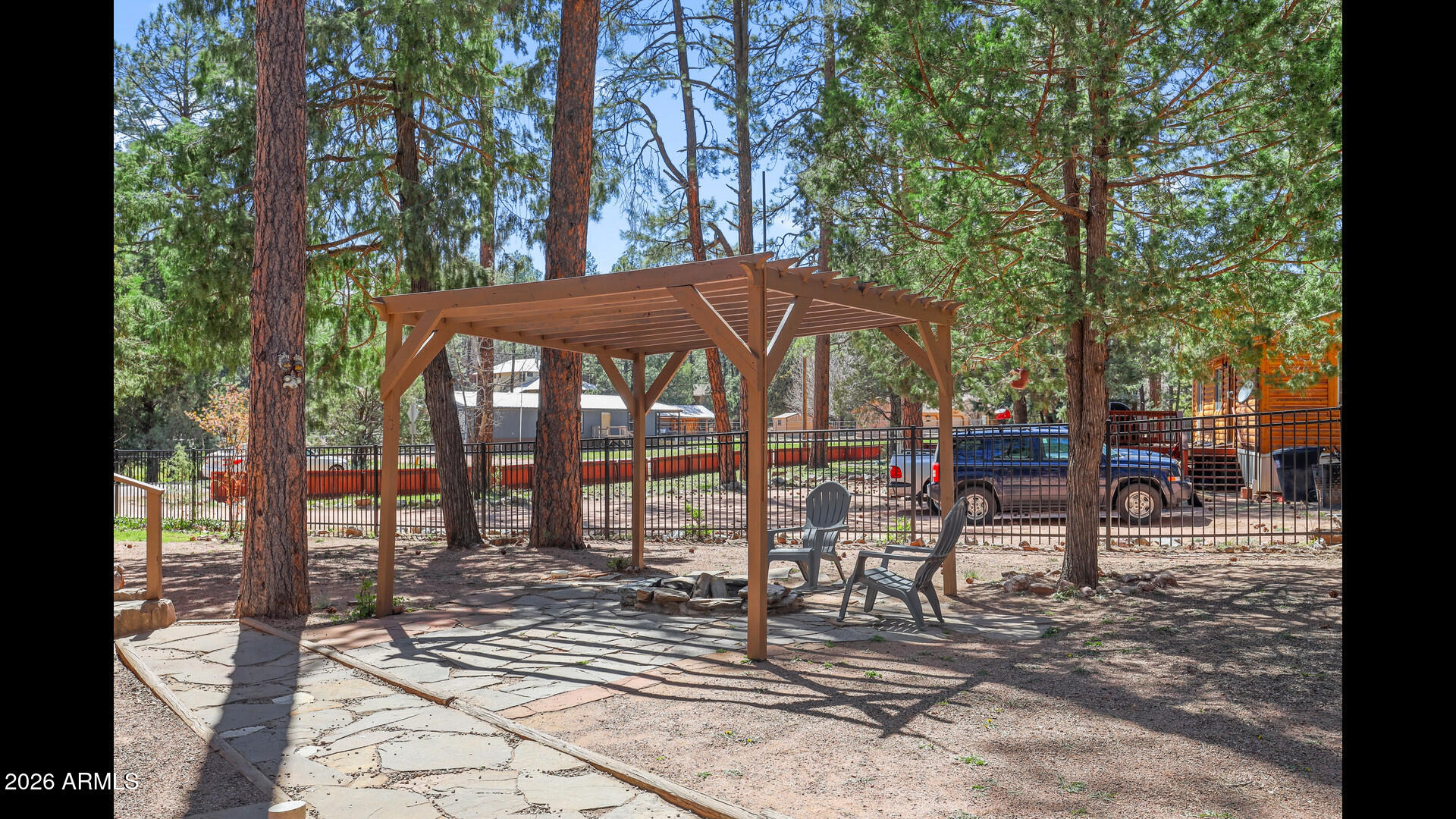 512 Standage Drive Payson, AZ 85541 - Photo 36 of 46 a view of a patio with a table chairs and backyard