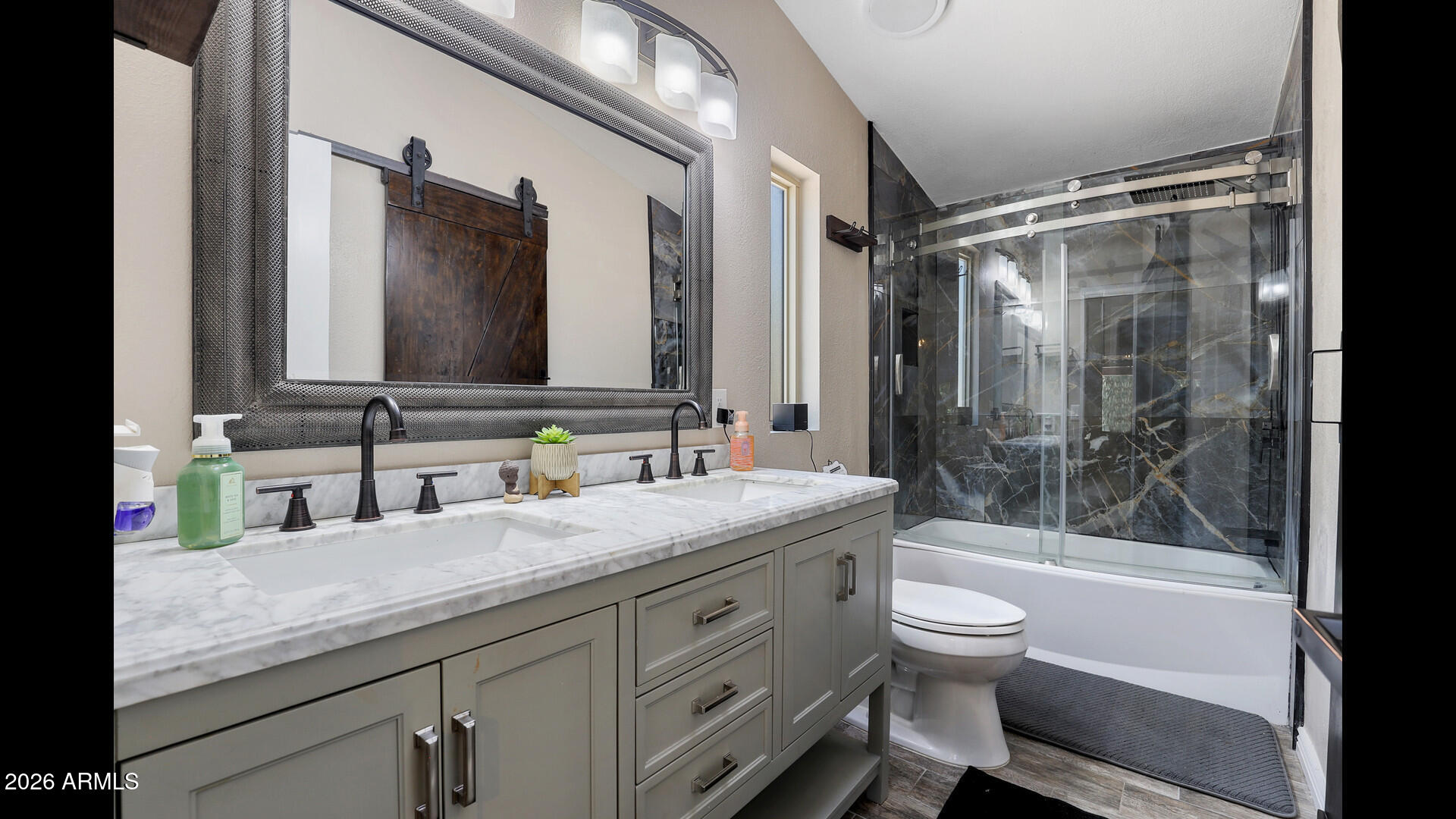 512 Standage Drive Payson, AZ 85541 - Photo 38 of 46 a bathroom with a granite countertop sink toilet mirror and bathtub