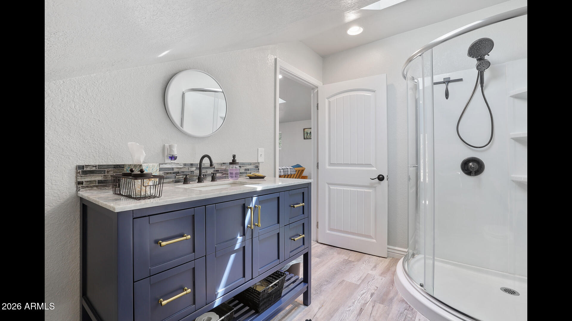 512 Standage Drive Payson, AZ 85541 - Photo 42 of 46 a bathroom with a granite countertop sink mirror and a shower
