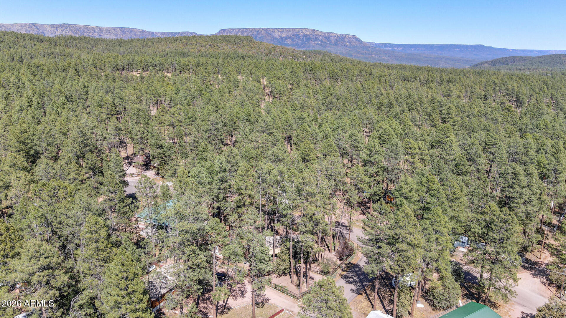 512 Standage Drive Payson, AZ 85541 - Photo 6 of 46 a view of a lush green hillside and a houses