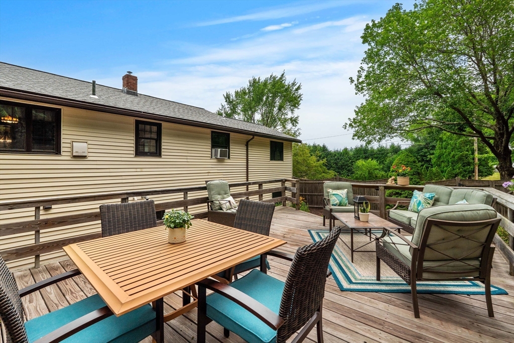 4 Alpha Road Groveland, MA 01834 - Photo 38 of 41 a roof deck with a table and chairs