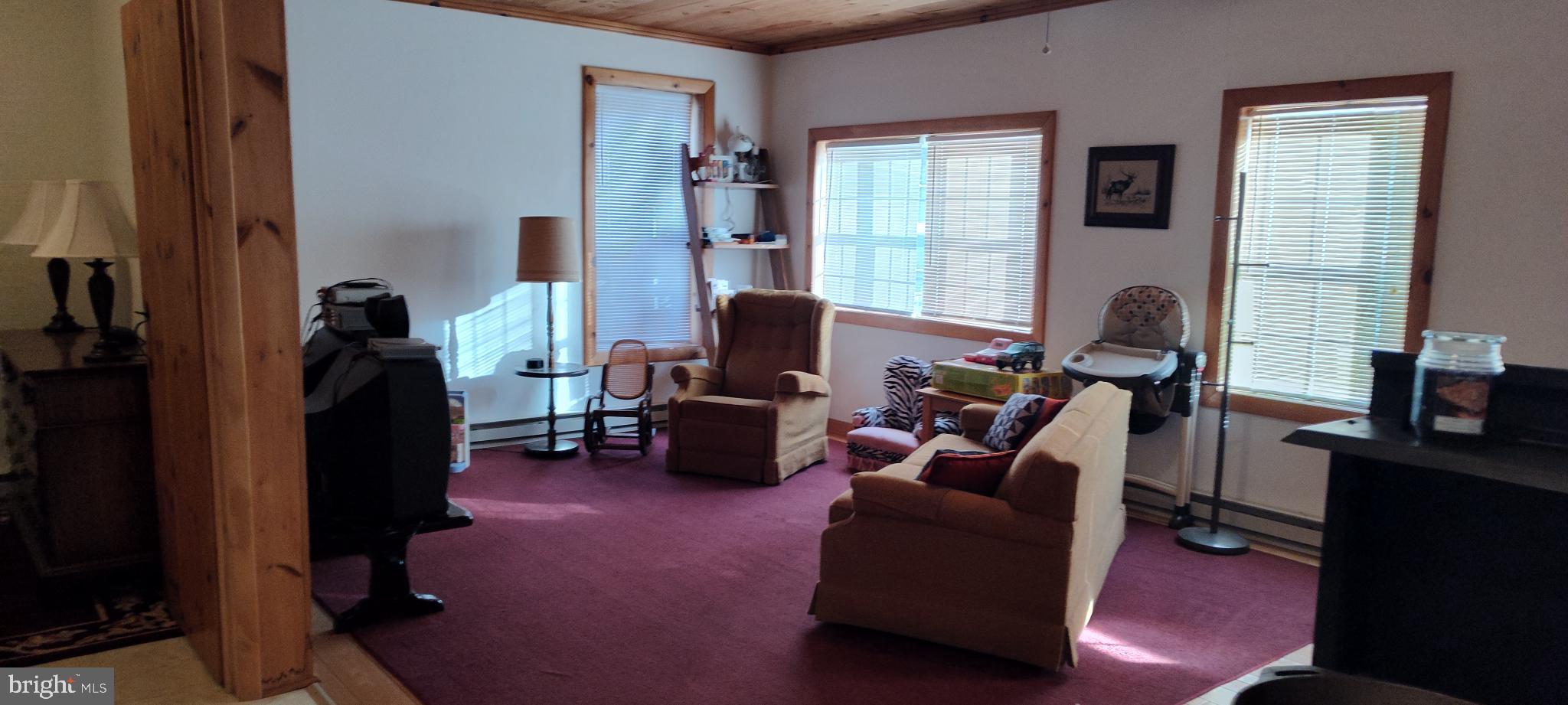 1339 Spruce Hill Road Port Royal, PA 17082 - Photo 12 of 114 a living room with furniture and a flat screen tv