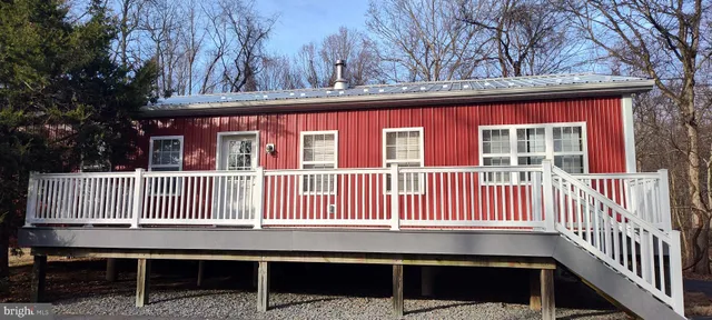 a view of backyard with green space