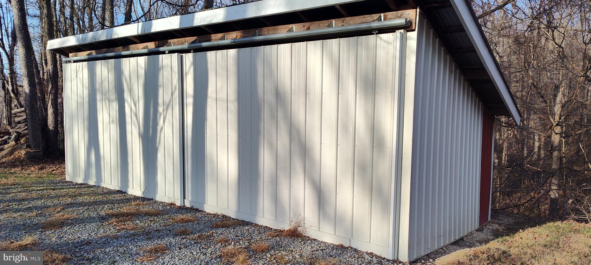 1339 Spruce Hill Road Port Royal, PA 17082 - Photo 20 of 114 Charming shed nestled among the trees.