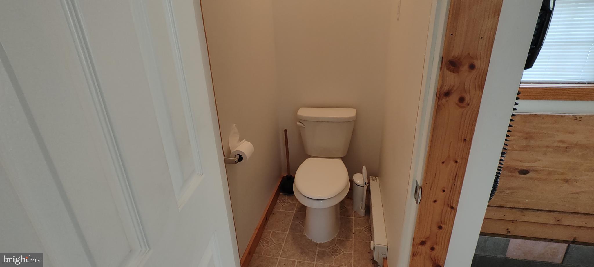 1339 Spruce Hill Road Port Royal, PA 17082 - Photo 66 of 126 a white toilet sitting next to a shower