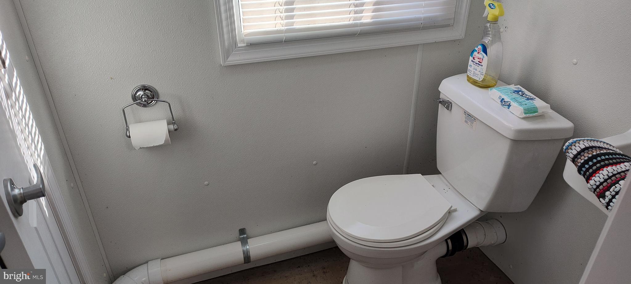 1339 Spruce Hill Road Port Royal, PA 17082 - Photo 75 of 114 a white toilet sitting next to a bathroom sink