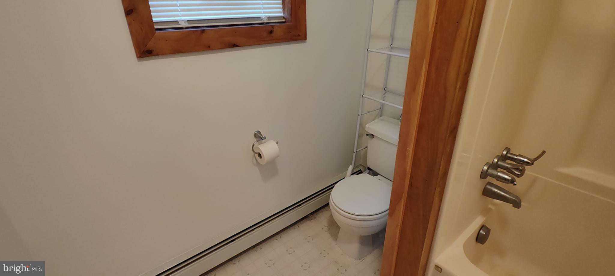 1339 Spruce Hill Road Port Royal, PA 17082 - Photo 7 of 114 a white toilet sitting next to a shower
