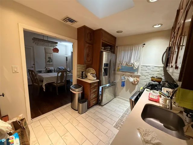 a view of a living room and bathroom