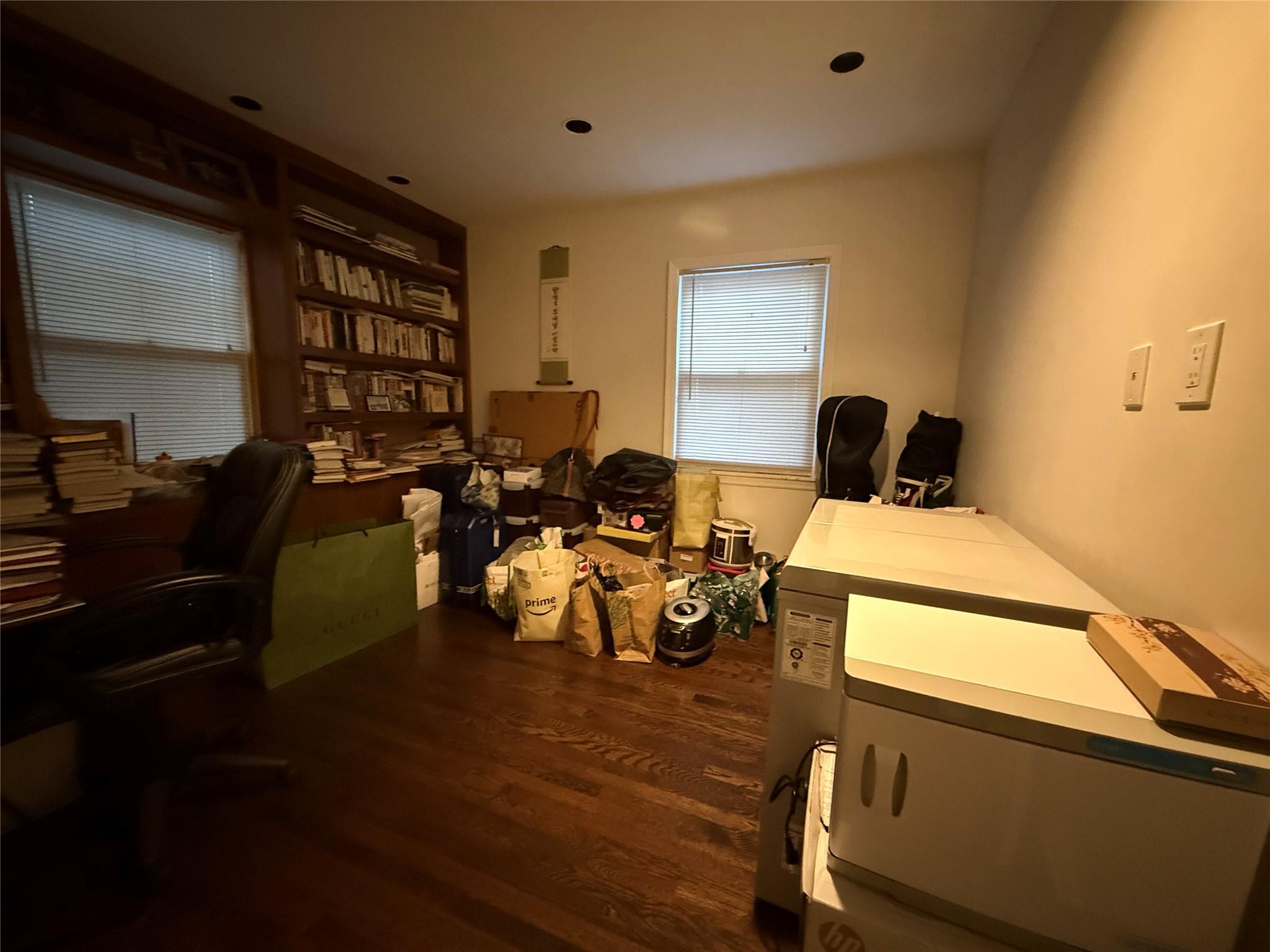 64-47 215th Street Queens, NY 11364 - Photo 9 of 15 a living room with furniture and a flat screen tv