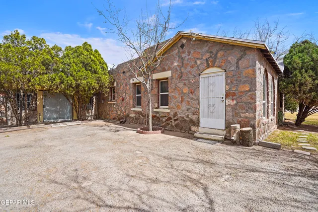 a view of swimming pool with a yard