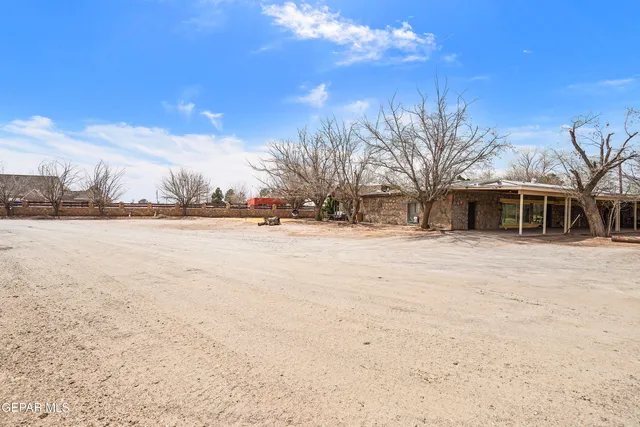 a view of large space with a house