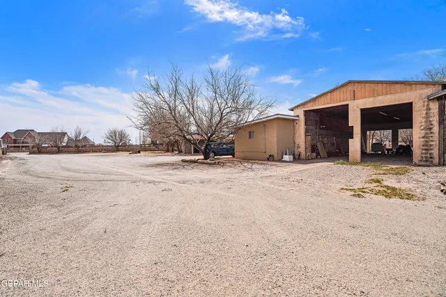 a view of a big room with gym equipment