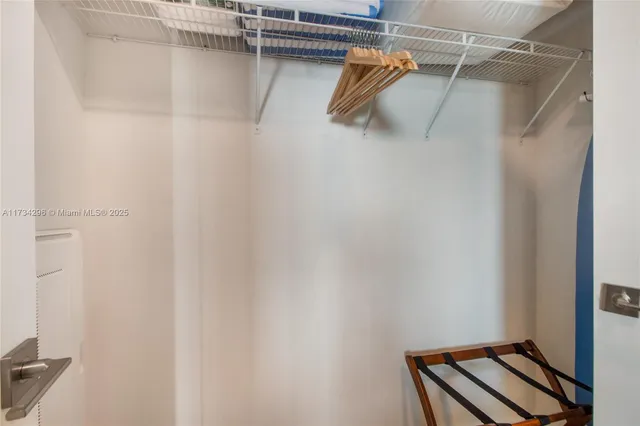 a view of a room with racks on the wall