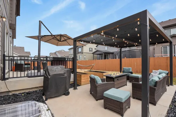a outdoor seating area with furniture