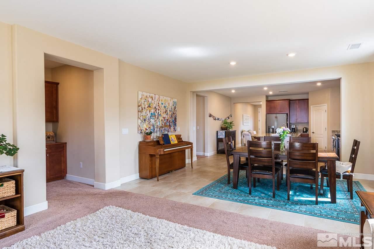 10155 Toltec Court Reno, NV 89521 - Photo 4 of 19 a view of a dining room with furniture
