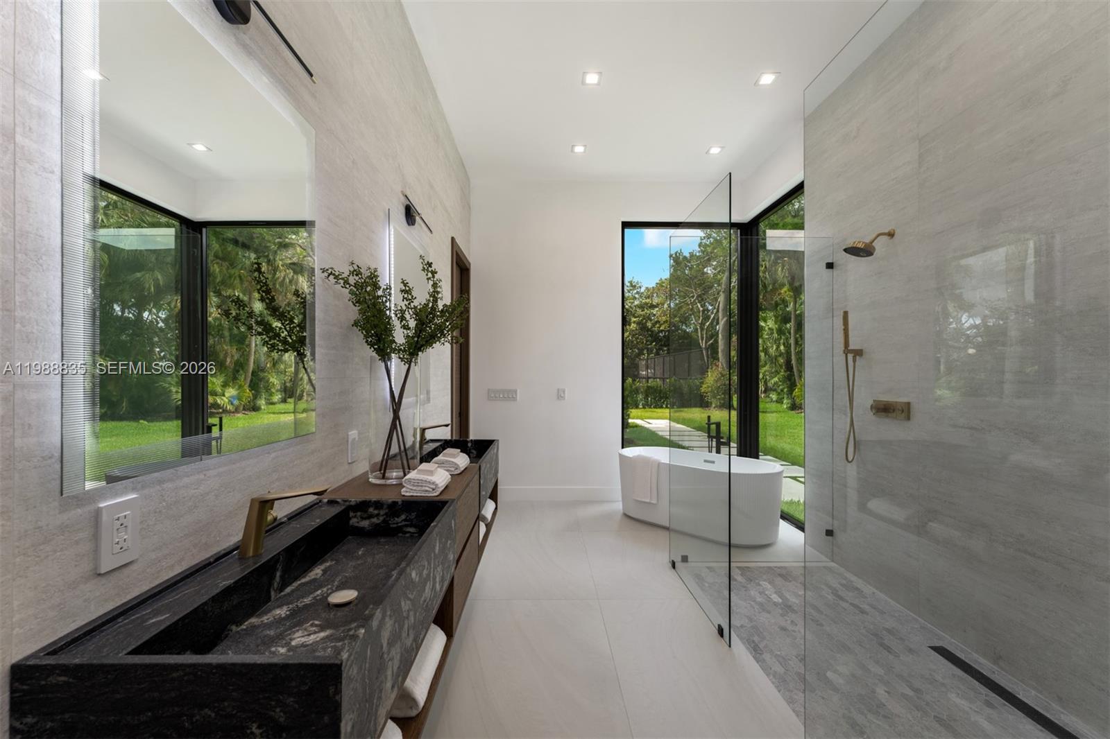 9790 Southwest 114th Street Miami, FL 33176 - Photo 20 of 47 a room with large windows and furniture