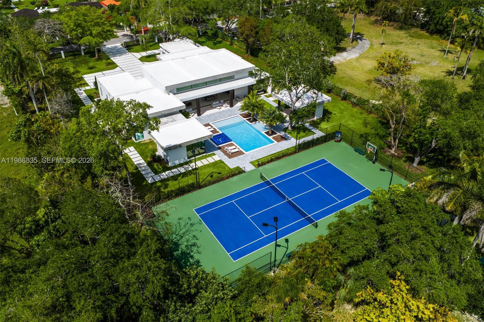 9790 Southwest 114th Street Miami, FL 33176 - Photo 2 of 47 an aerial view of a house with a yard