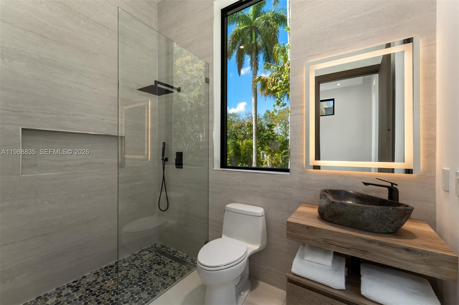 9790 Southwest 114th Street Miami, FL 33176 - Photo 24 of 47 a bathroom with a toilet sink and shower