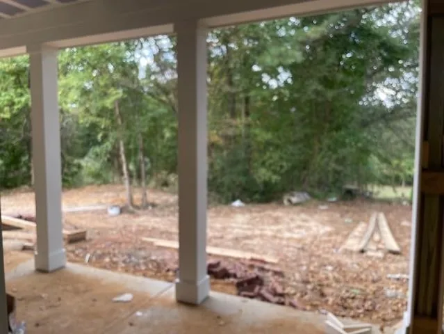 a view of a yard with porch