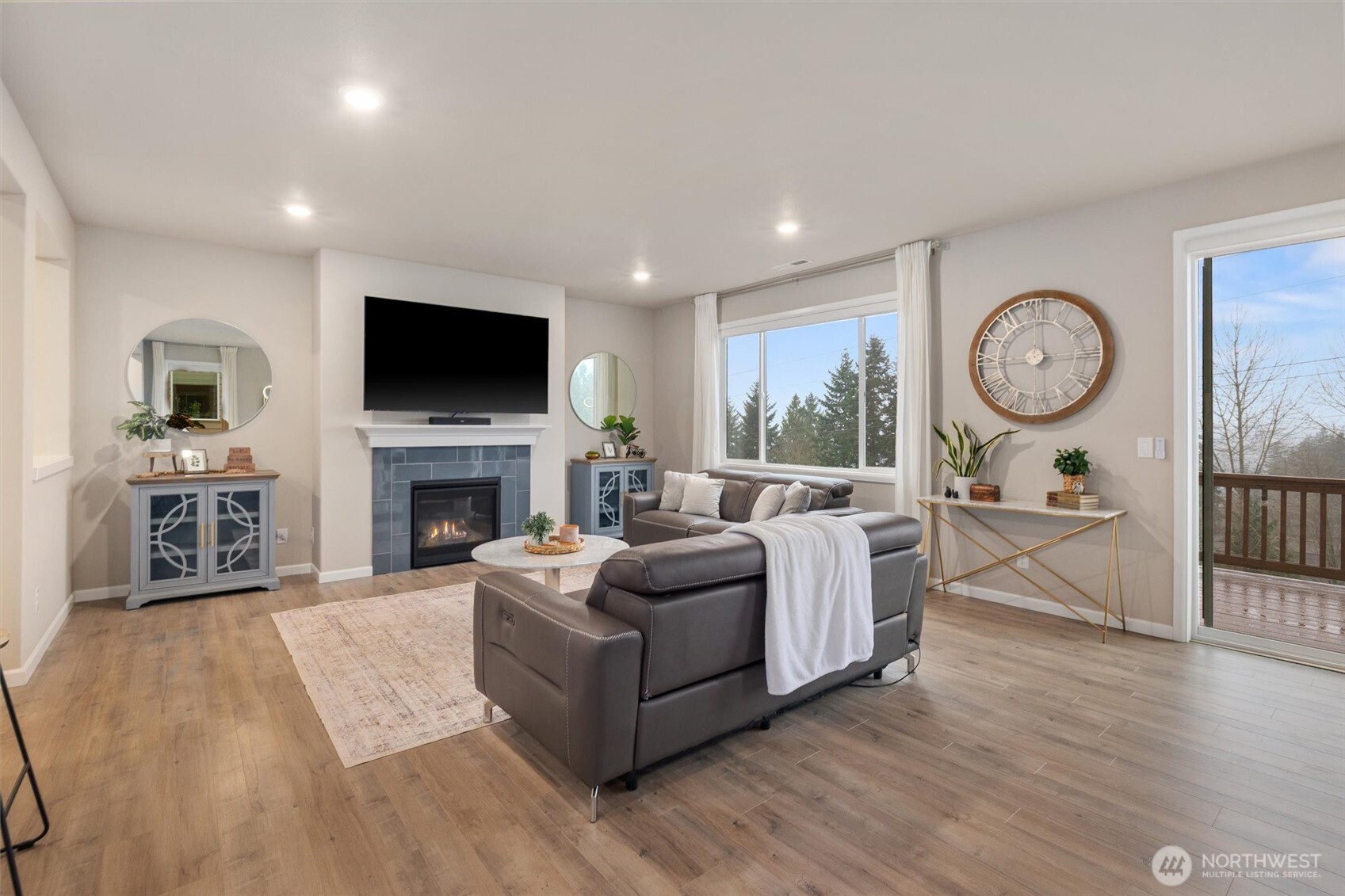 23718 43rd Drive Southeast Bothell, WA 98021 - Photo 15 of 40 a living room with fireplace furniture and a flat screen tv