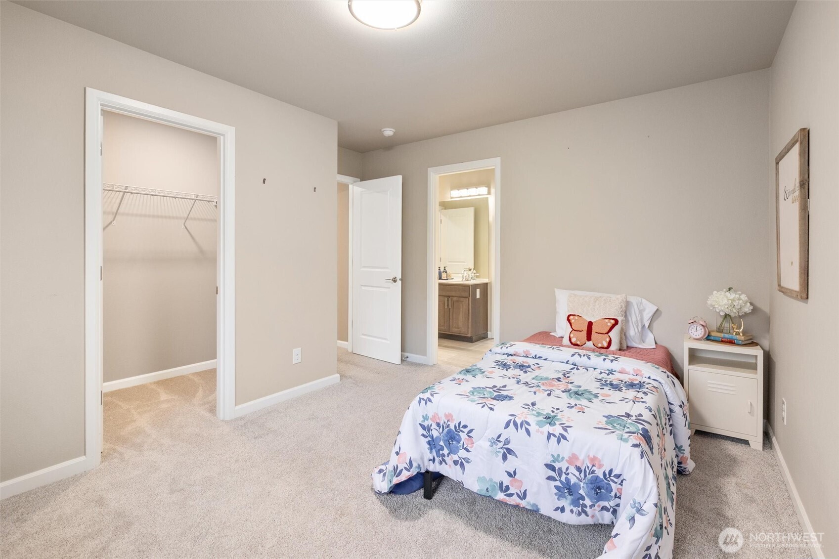 23718 43rd Drive Southeast Bothell, WA 98021 - Photo 27 of 40 a bedroom with a bed and a lamp