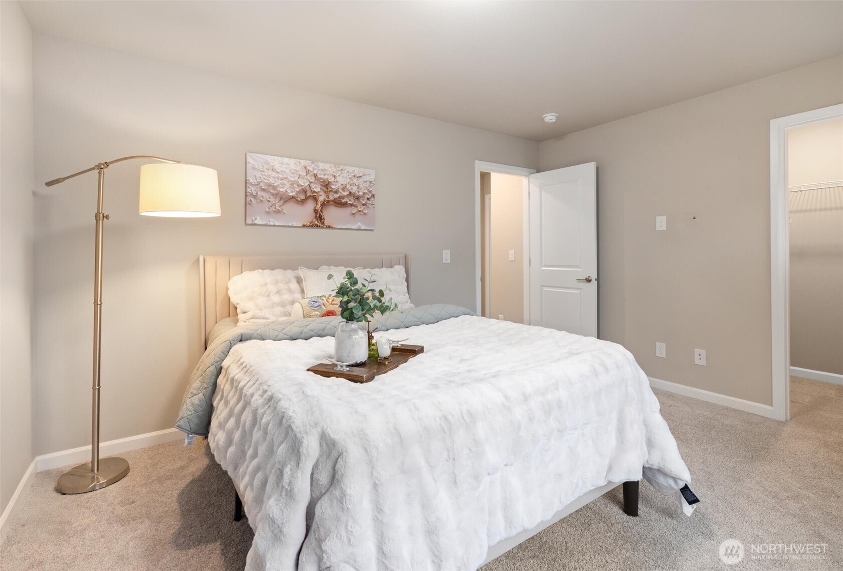 23718 43rd Drive Southeast Bothell, WA 98021 - Photo 28 of 40 a bedroom with a bed and painting on the wall
