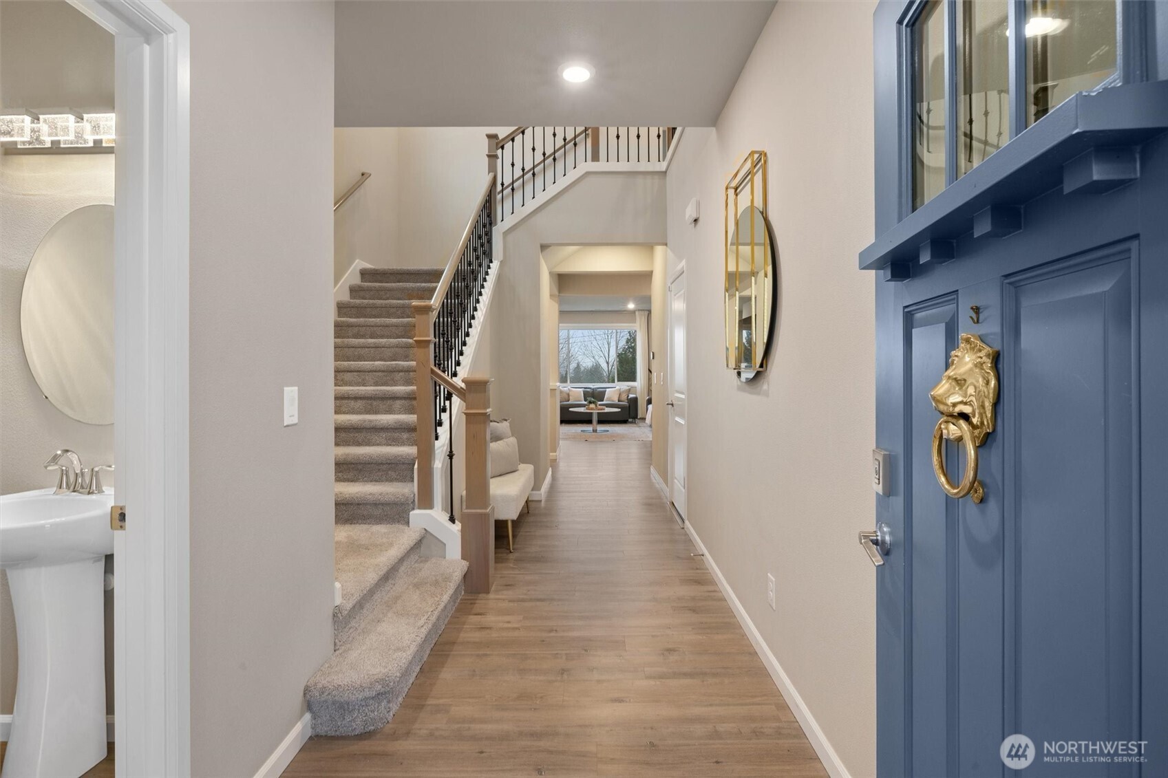 23718 43rd Drive Southeast Bothell, WA 98021 - Photo 3 of 40 a view of hallway with wooden floor and stairs