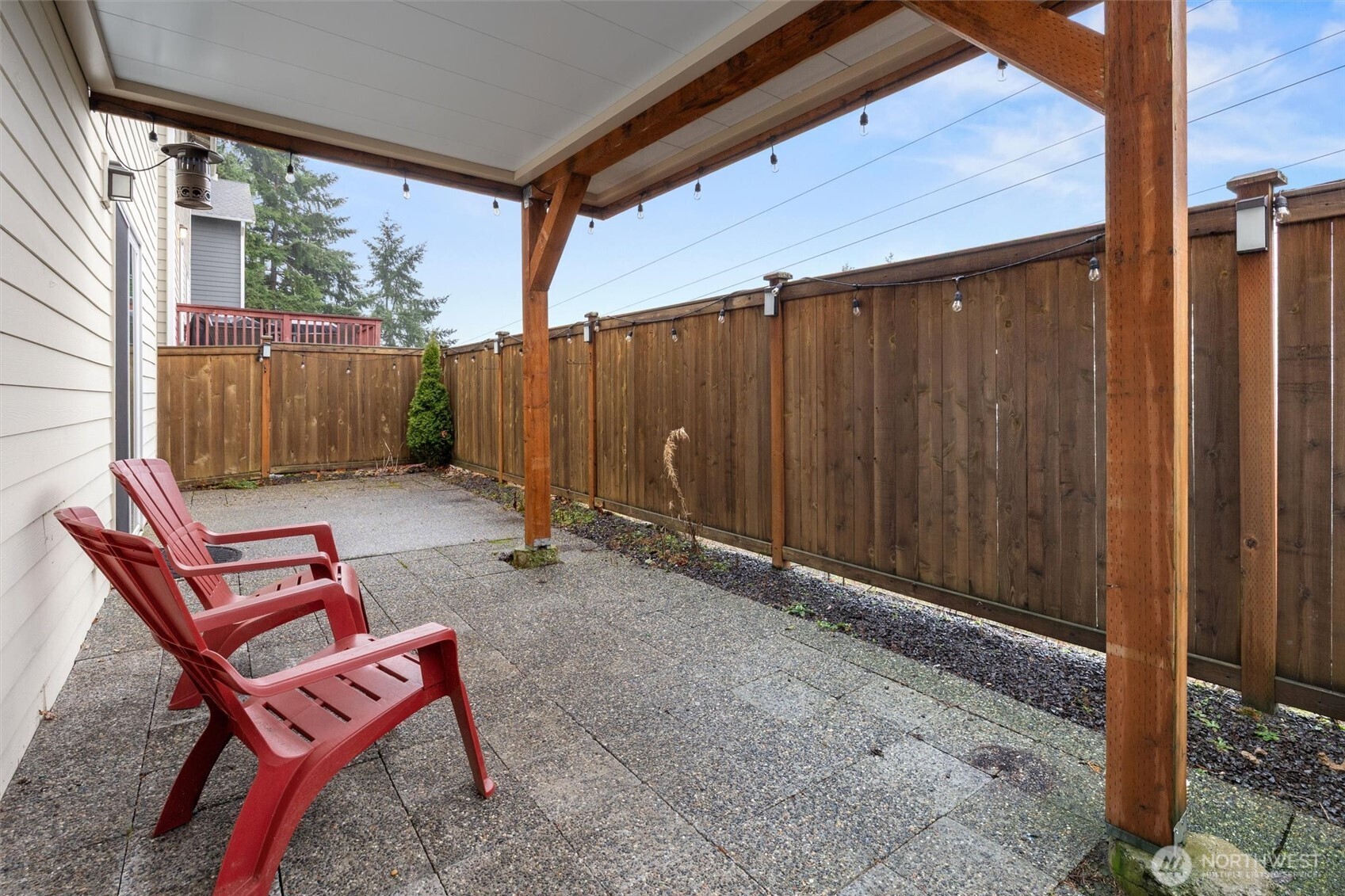 23718 43rd Drive Southeast Bothell, WA 98021 - Photo 36 of 40 a backyard of a house with yard and outdoor seating