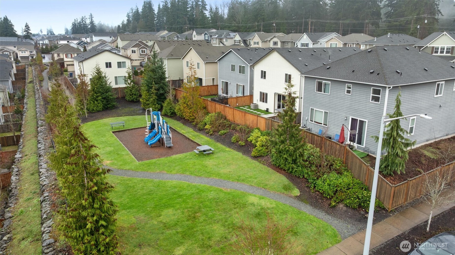 23718 43rd Drive Southeast Bothell, WA 98021 - Photo 39 of 40 a front view of a house with a yard