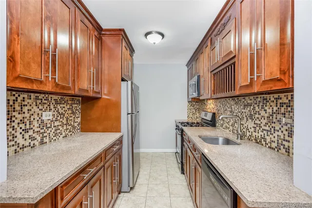 a kitchen with a cabinets and a sink