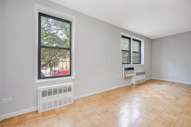 a view of an empty room with a window