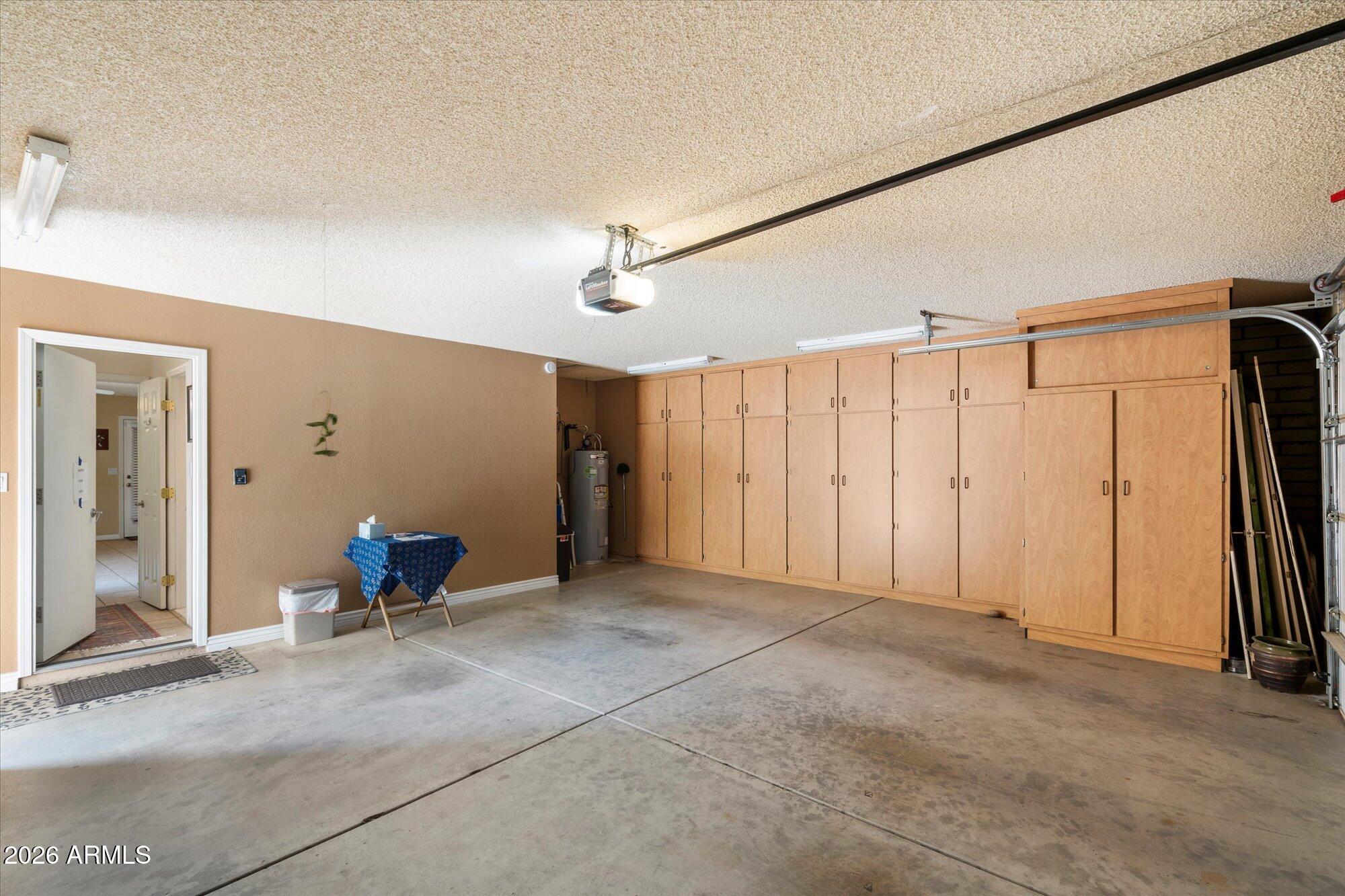 14242 North 9th Street Phoenix, AZ 85022 - Photo 15 of 26 a view of a livingroom with staircase and door