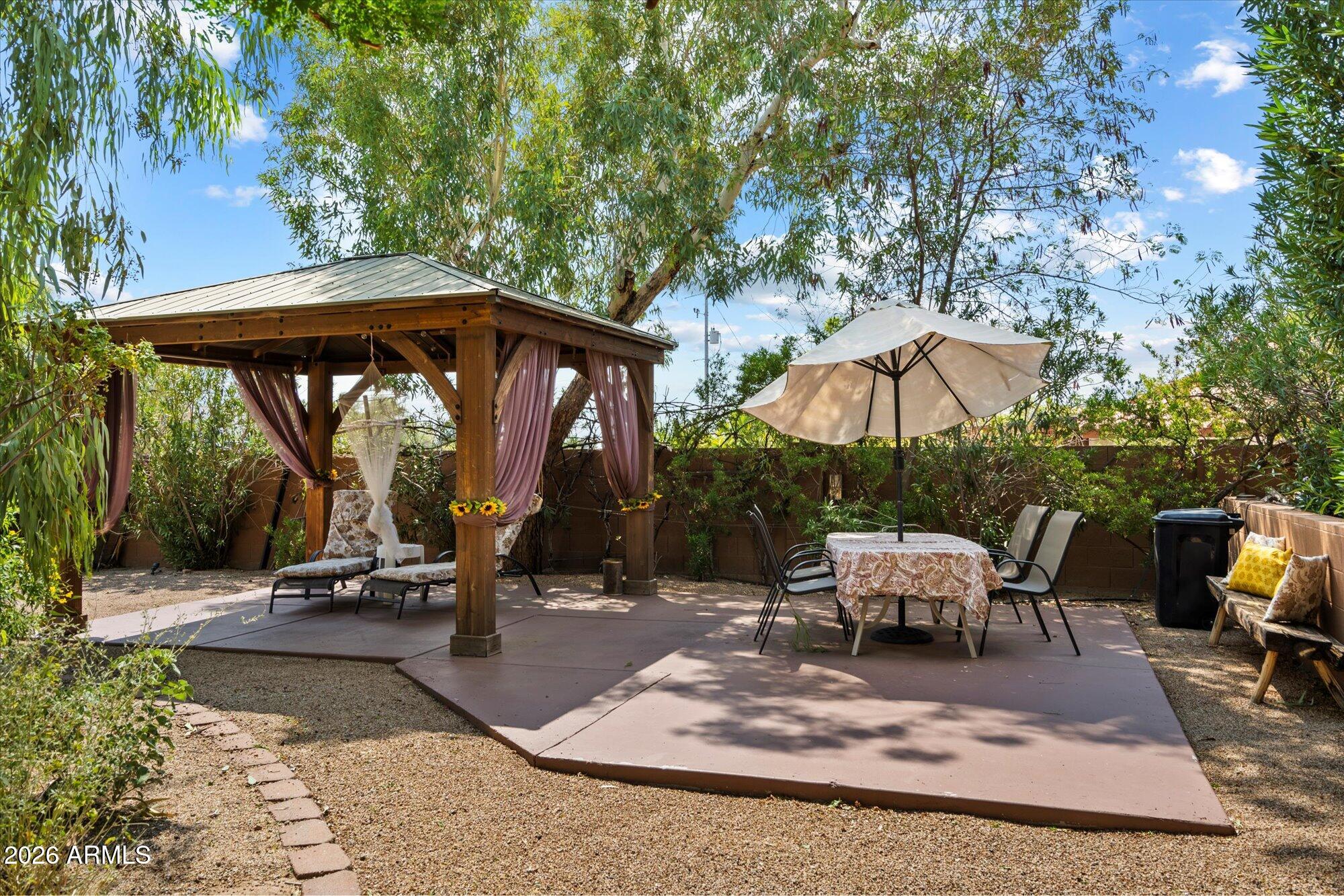 14242 North 9th Street Phoenix, AZ 85022 - Photo 19 of 26 a view of outdoor space yard deck patio and outdoor kitchen