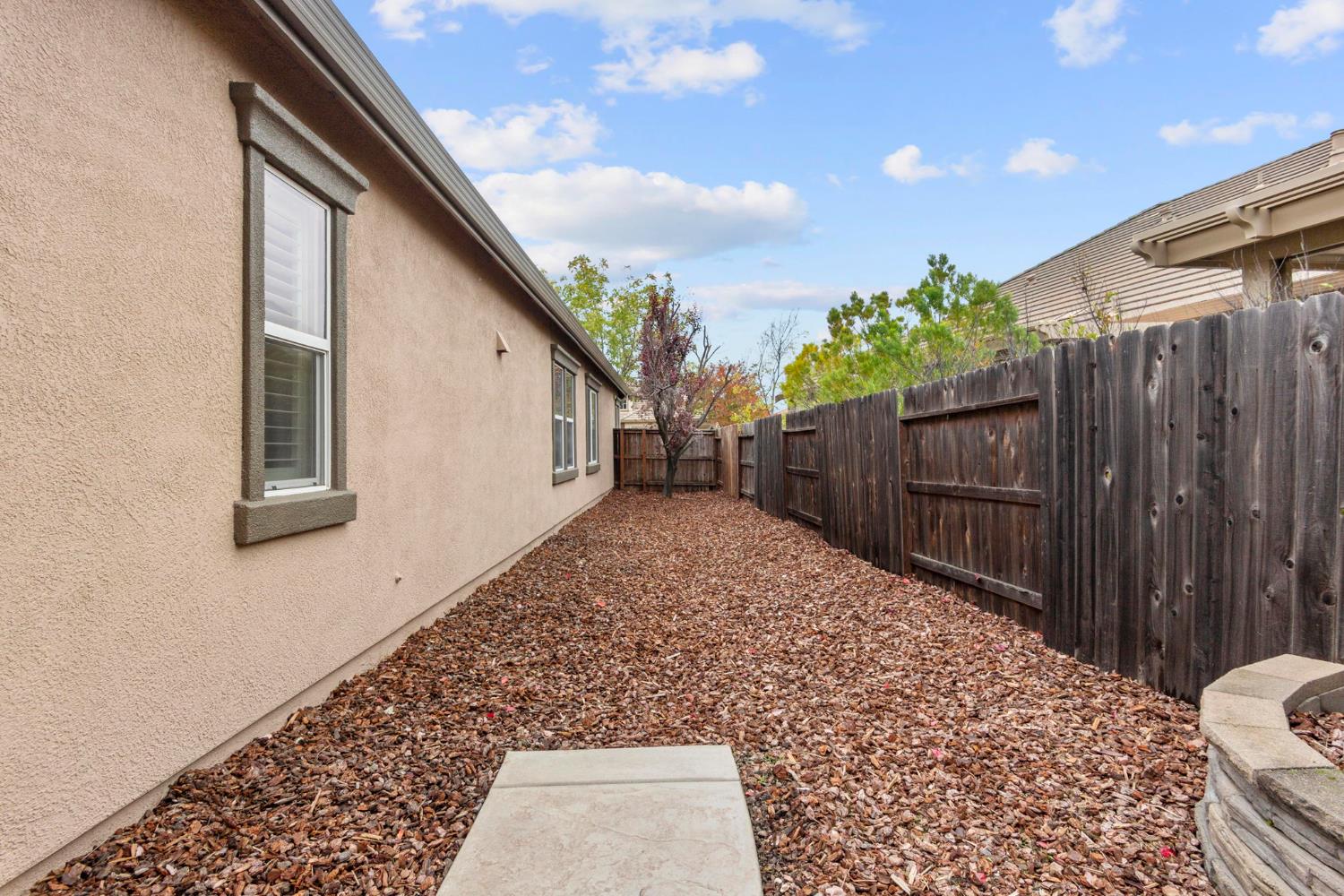 2144 Penstone Loop Roseville, CA 95747 - Photo 54 of 60 a house view with a backyard