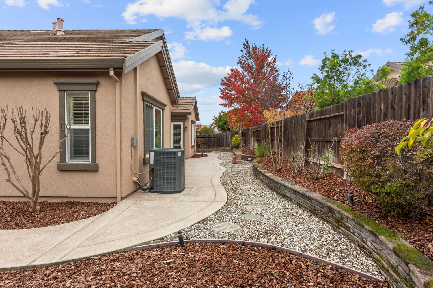 2144 Penstone Loop Roseville, CA 95747 - Photo 56 of 60 a view of a house with a patio