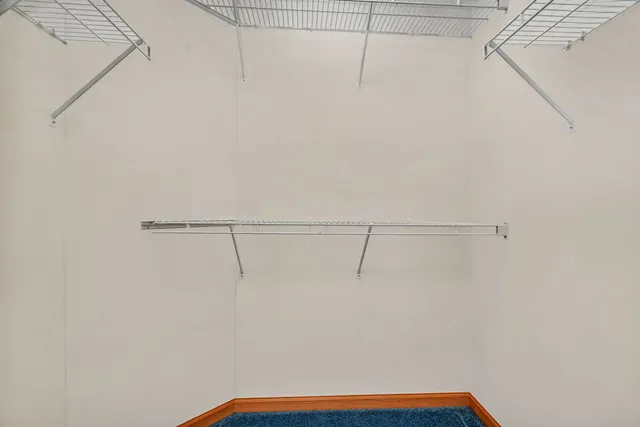 a view of a room with racks on the wall