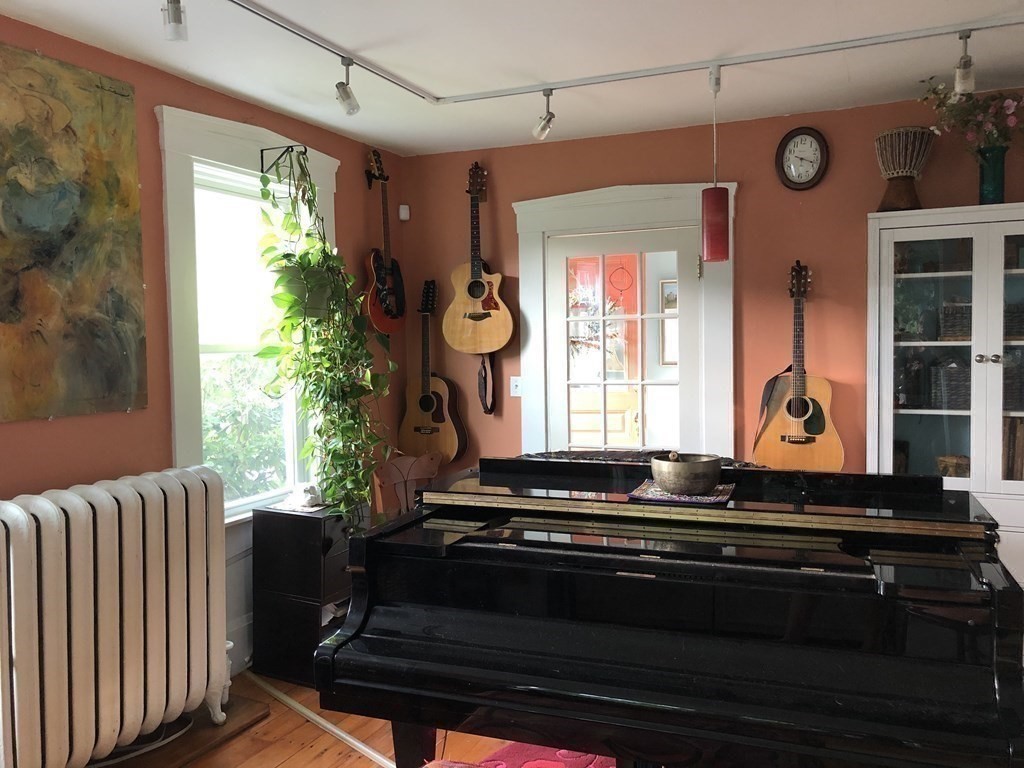 7 Grasshopper Lane Walpole, MA 02081 - Photo 14 of 42 a living room with wooden floor and furniture
